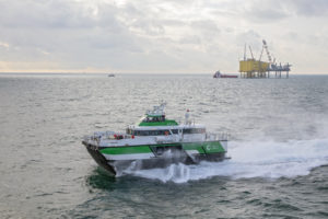 Umoe Rapid fast crew transfer vessel at offshore windfarm